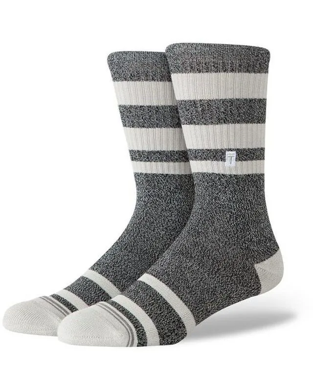 Sporting crew socks on foot
